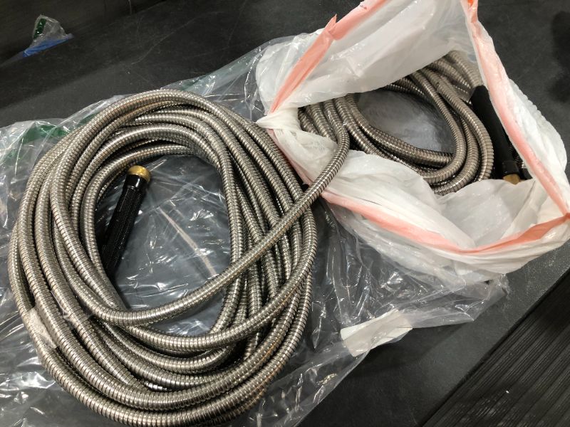 Photo 1 of 1/2 INCH DIAMETER METAL HOSE, UNKNOWN LENGTH