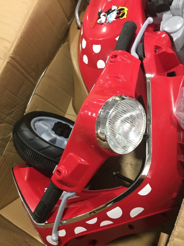 Photo 5 of Kid Trax Toddler Minnie Mouse Vespa Scooter Electric Ride On Toy, 3-5 Years Old, 6 Volt, Max Weight 60 lbs, Red (KT1583AZ)