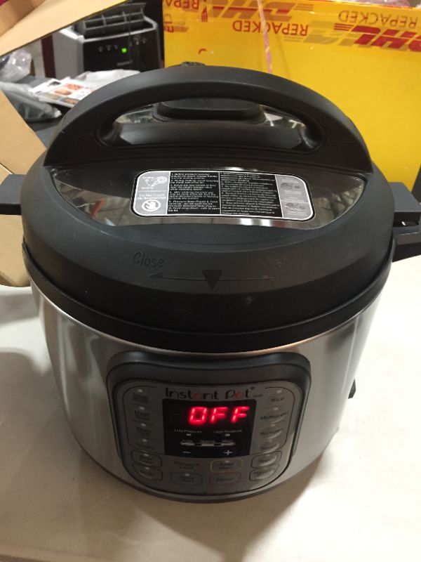 Photo 1 of Instant Pot Duo 7-in-1 Electric Pressure Cooker, Slow Cooker, Rice Cooker, Steamer, Saute, Yogurt Maker, Sterilizer, and Warmer, 6 Quart, 13 One-Touch Programs
