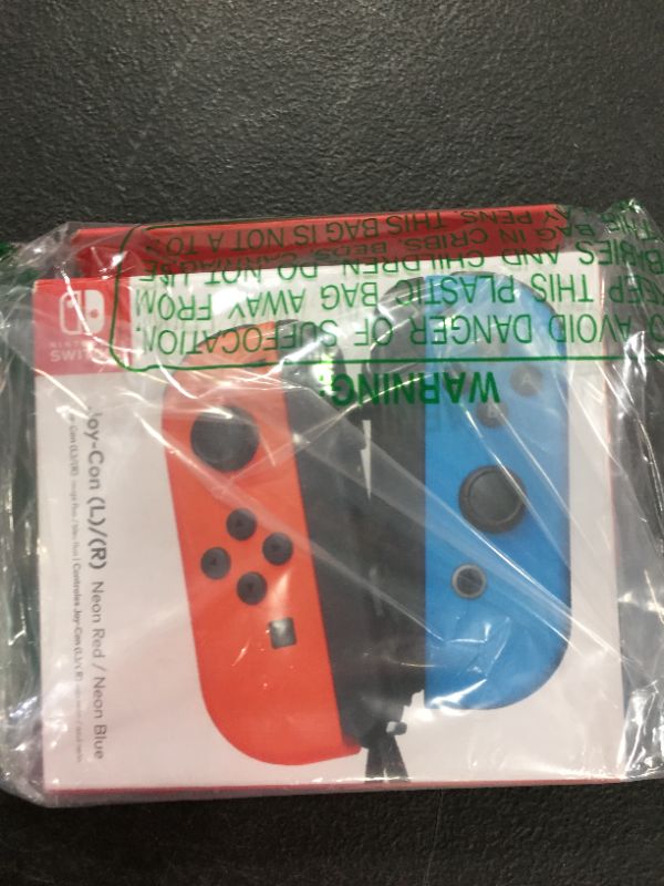Photo 1 of Nintendo Switch Joy-Con (L)/(R) Neon Red/Neon Blue