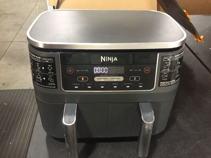 Photo 2 of Ninja DZ201 Air Fryer Foodi 6-in-1 8 Quart DualZone Technology, with 2 Crisper Plates 2 Independent Baskets, for Quick Easy Meals, Dark Grey Stainless Finish
