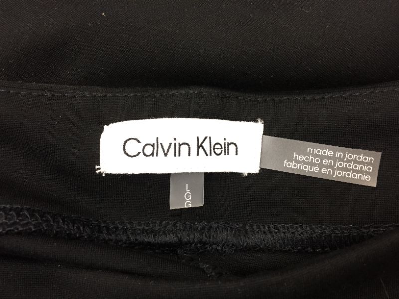 Photo 3 of Calvin Klein womens Modern Essential Legging Jean- Large
