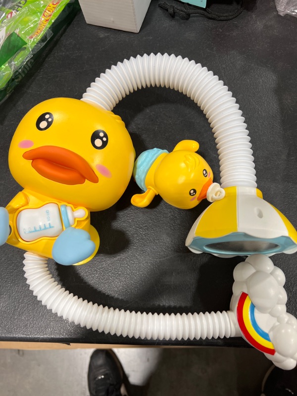 Photo 1 of Electric Cute Duck Shape Shower Nozzle Rotatable Bath Toys For Baby