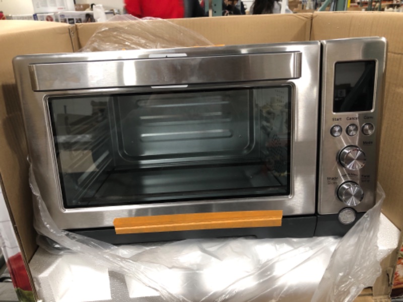 Photo 4 of GE 6-Slice Stainless Steel Convection Toaster Oven with Quartz Heating Element and 7 Cook Modes, Silver
