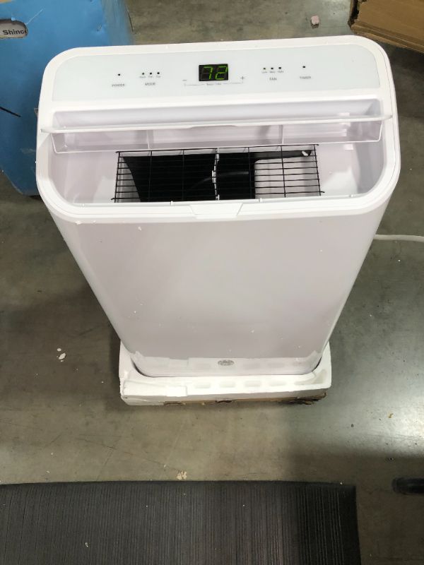 Photo 3 of GE Appliances 3-in-1, APCA12YZMW, White GE Portable Air Conditioner with Dehumidifier for Medium Rooms up to 450 sq ft, 12,000 (8,200 BTU SACC)