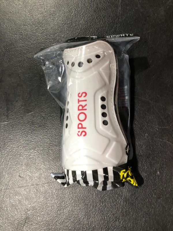 Photo 1 of 7 inch white Soccer Shin Guards 