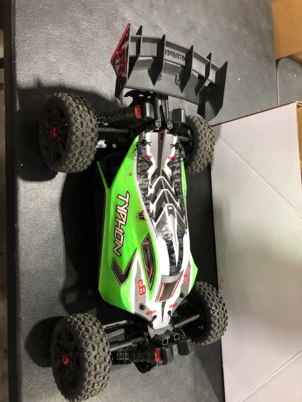 Photo 4 of ARRMA 1/10 Typhon 4X4 V3 MEGA 550 Brushed Buggy RC Truck RTR (Transmitter, Receiver, NiMH Battery and Charger Included), Green, ARA4206V3

