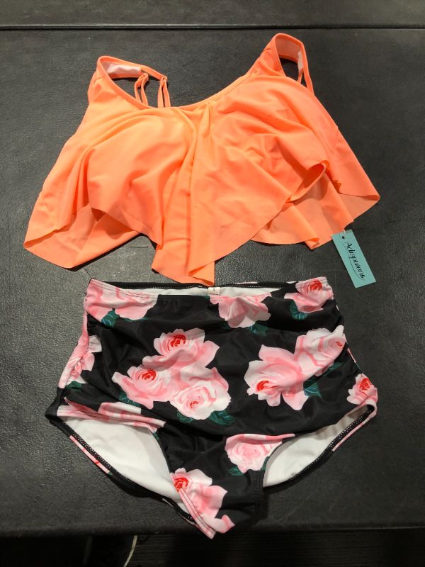 Photo 1 of adisputent orange top with black bottoms Small 