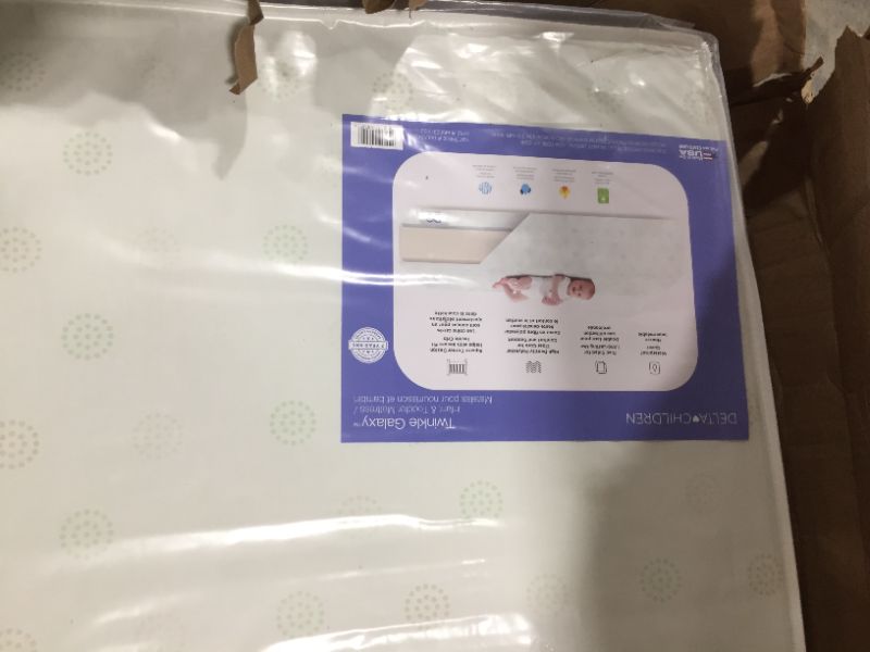 Photo 2 of Delta Children Twinkle Galaxy Dual Sided Crib and Toddler Mattress - Premium Sustainably Sourced Fiber Core - Waterproof - GREENGUARD Gold