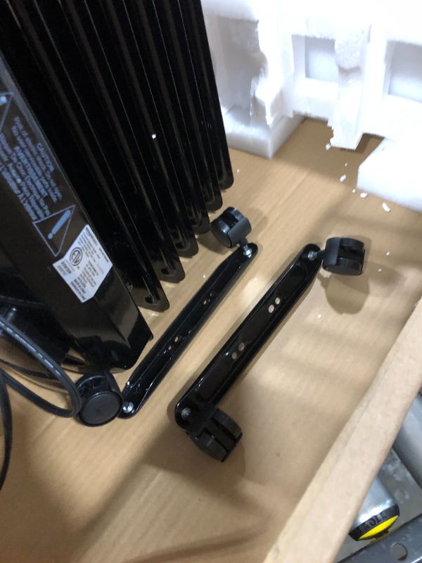 Photo 4 of Amazon Basics Indoor Portable Radiator Heater - Black
