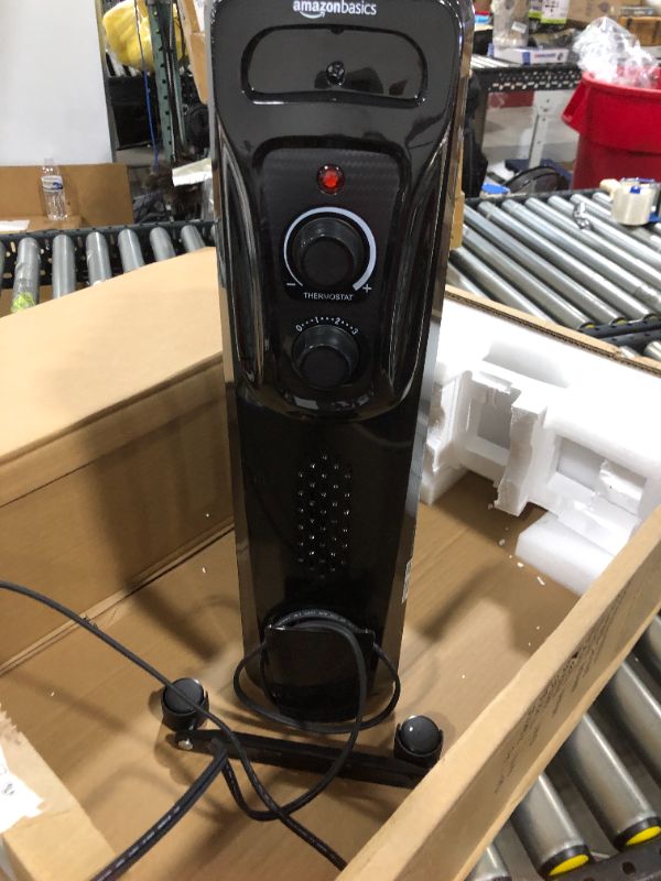 Photo 2 of Amazon Basics Indoor Portable Radiator Heater - Black
