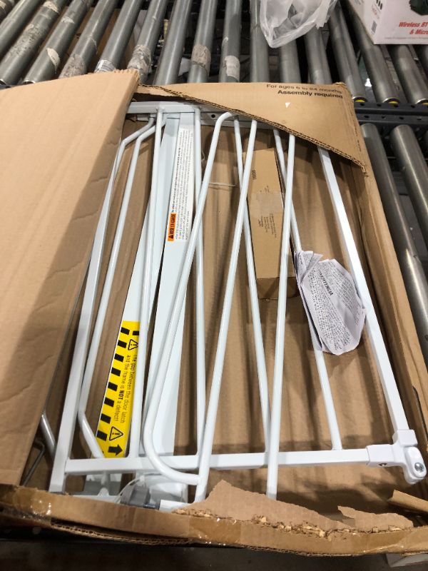 Photo 1 of Regalo Easy Step 38.5-Inch Extra Wide Walk Thru Baby Gate, Includes 6-Inch Extension Kit, 4 Pack Pressure Mount Kit, 4 Pack Wall Cups and Mounting Kit
