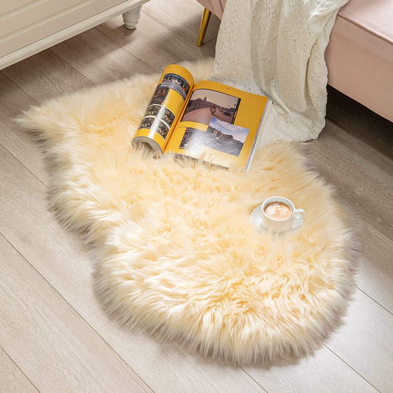 Photo 1 of BAYKA Faux Sheepskin Fur Area Rug, Luxury Fluffy Area Rug, Soft Furry Carpet Rug for Bedroom, Children’s Room, Decor Rug 2x3 Feet, Light Yellow
