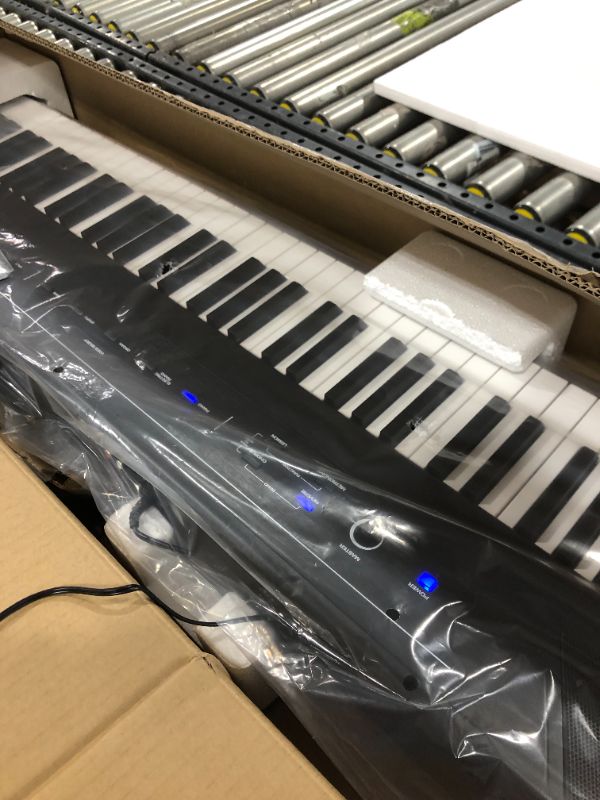 Photo 1 of Alesis Recital – 88 Key Digital Piano Keyboard with Semi Weighted Keys, 2x20W Speakers, 5 Voices, Split, Layer and Lesson Mode, FX and Piano Lessons
