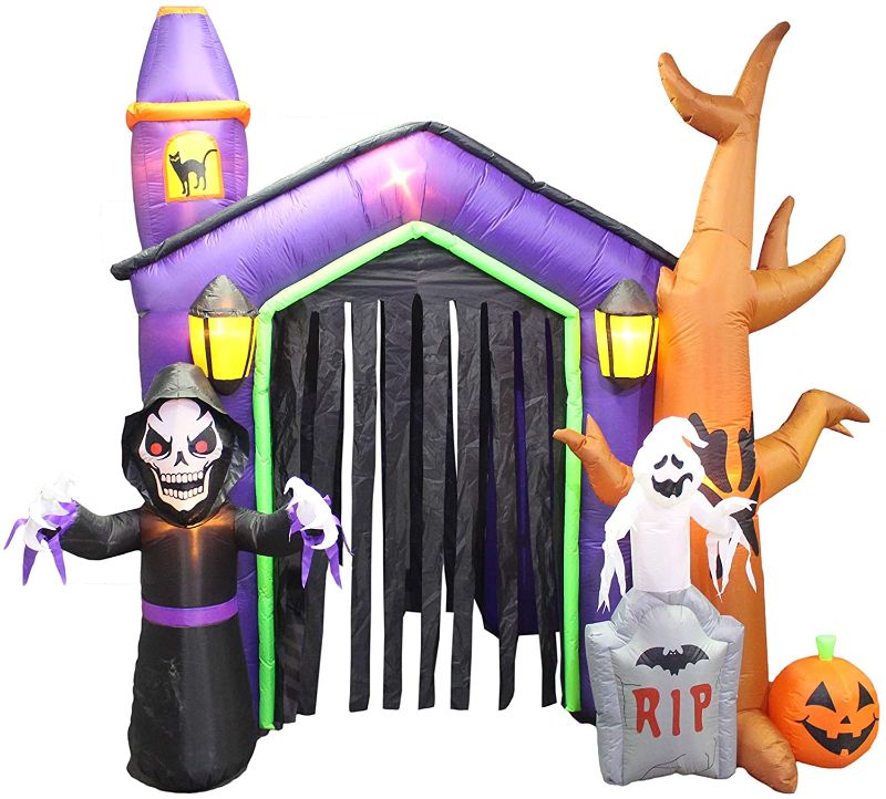 Photo 1 of  8.5 Foot Halloween Inflatable Haunted House Castle with Skeleton, Ghost & Skulls
