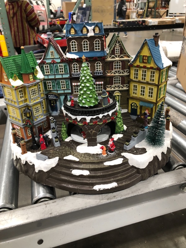Photo 1 of Christmas Village House Decoration,Colourful LED Lights Light Up Streets and Buildings,Rotating Christmas Trees and Roller Skaters,Music Rendering Atmosphere
