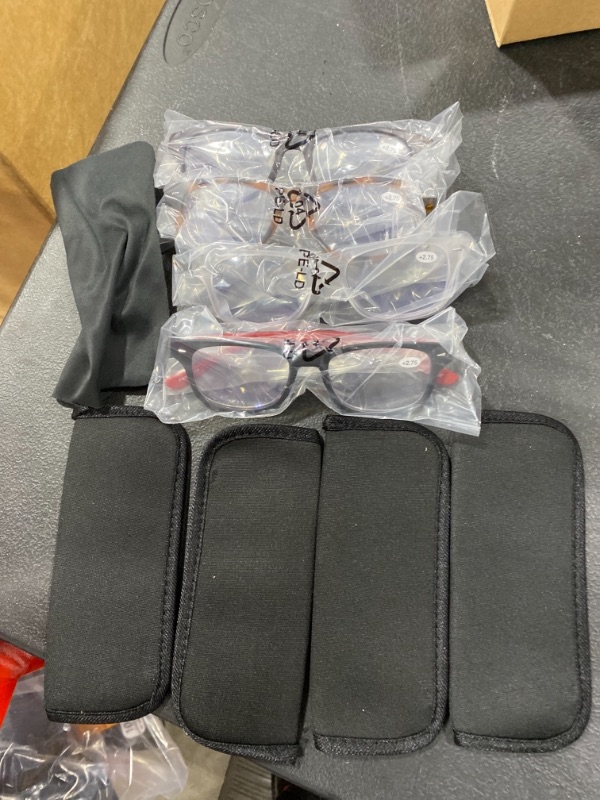 Photo 1 of 2.75 pack of four eye glasses with padded casing for each 