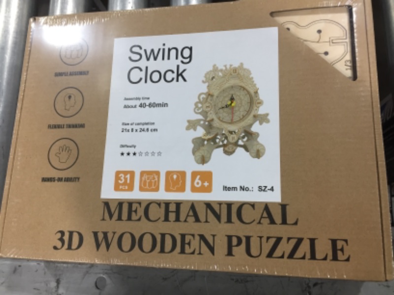 Photo 1 of mechanical 3d wooden swing clock puzzle 