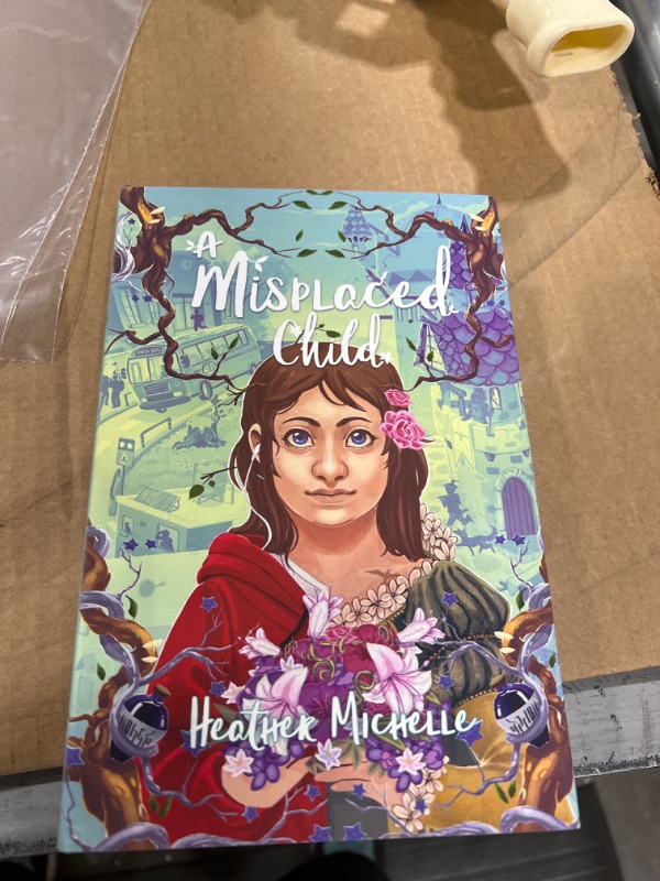 Photo 2 of A Misplaced Child (1) (The Misplaced Children) Hardcover – September 15, 2020
