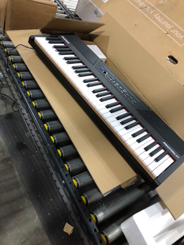 Photo 2 of Alesis Recital 61 – 61 Key Digital Piano Keyboard with Semi Weighted Keys, 20W Speakers, 10 Voices, Split, Layer and Lesson Mode, FX and Piano Lessons