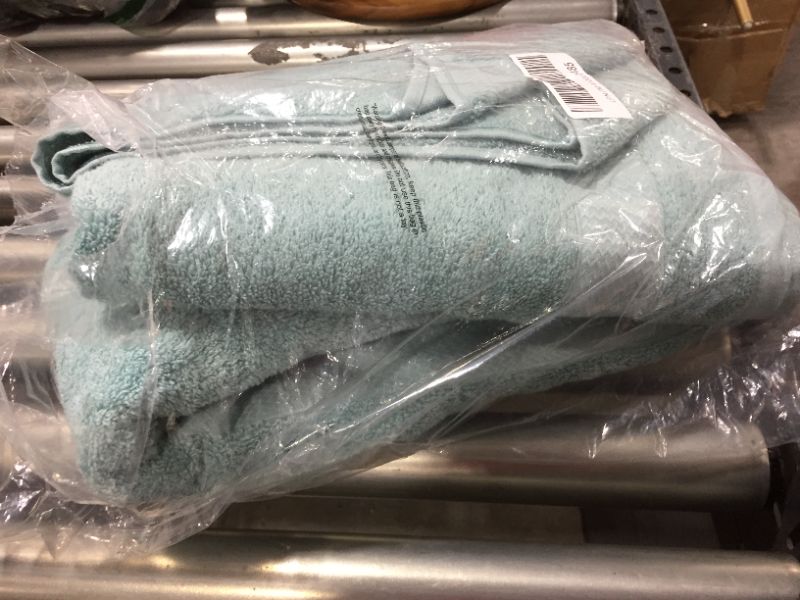 Photo 1 of 2 teal towels 