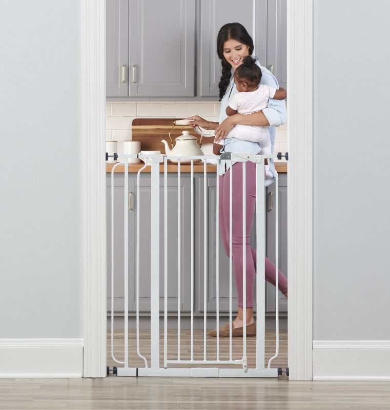 Photo 1 of REGALO Easy Step Extra Tall Safety Gate