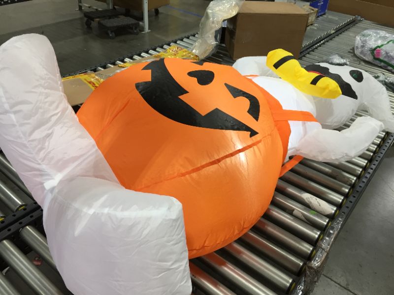 Photo 1 of 4 FT HALLOWEEN INFLATABLE, MISSING GROUND STAKES