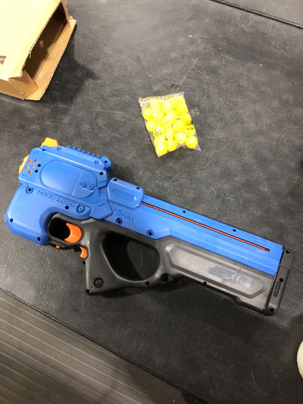 Photo 2 of Nerf Rival Charger MXX-1200 Motorized Blaster -- 12-Round Capacity, 100 FPS Velocity -- Includes 24 Official Nerf Rival Rounds -- Team Blue