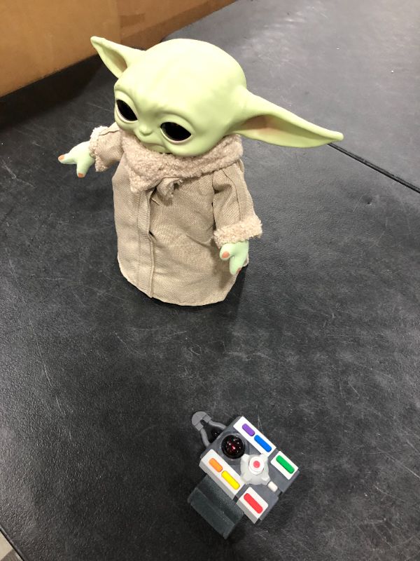 Photo 2 of Star Wars Grogu, The Child, 12-in Plush Motion RC Toy from The Mandalorian, Collectible Stuffed Remote Control Character for Movie Fans of All Ages, 3 Years and Older