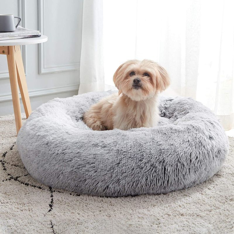 Photo 1 of Calming Dog Bed & Cat Bed, Anti-Anxiety Donut Dog Cuddler Bed, Warming Cozy Soft Dog Round Bed, Fluffy Faux Fur Plush Dog Cat Cushion Bed for Small Medium Dogs and Cats 30"