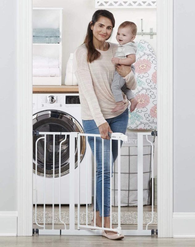 Photo 1 of Regalo Easy Step 38.5-Inch Extra Wide Walk Thru Baby Gate, Includes 6-Inch Extension Kit, 4 Pack Pressure Mount Kit, 4 Pack Wall Cups and Mounting Kit
