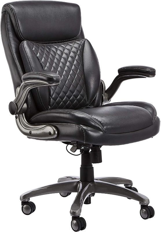 Photo 1 of AmazonCommercial Ergonomic High-Back Executive Chair with Flip-up Armrests and Motive Lumbar Support, Black Bonded Leather
