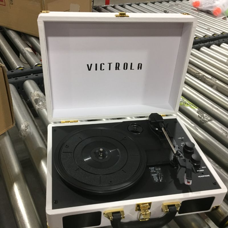 Photo 4 of Victrola Vintage 3-Speed Bluetooth Portable Suitcase Record Player with Built-in Speakers | Upgraded Turntable Audio Sound| Includes Extra Stylus | White (VSC-550BT-WH)
