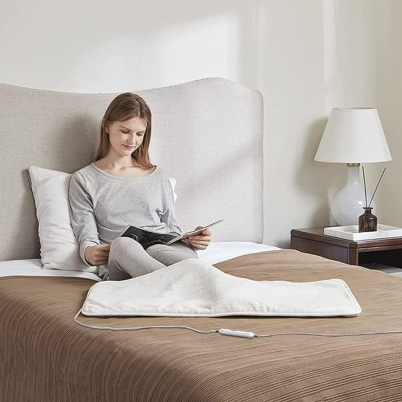 Photo 1 of Serta Siena Heating Pad Large Foot Warmer, Soft Sleeve Pocket, Zero EMF, Auto Shut Off Multi-Heat Setting Controller, Extra Wide Electric Heated Wrap For Shoulder, Back, Stomach Comfort 35"x20" Ivory
