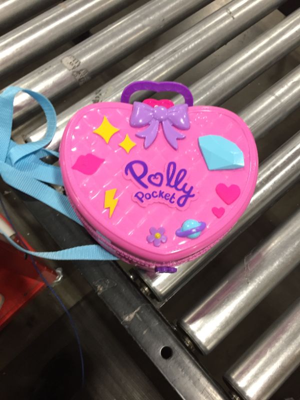 Photo 3 of Polly Pocket Theme Park Backpack Compact with 2 Dolls, Accessories & Multiple Activities
