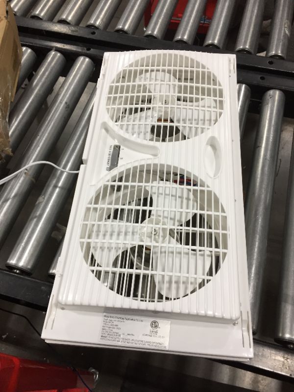 Photo 3 of 9-inch Twin Window Fan with Manual Reversible Airflow Control, Auto-Locking Expanders, and 2-Speed Fan Switch (Min. 22.4" Max. 34.3") Expanders and Leg Stands Included
