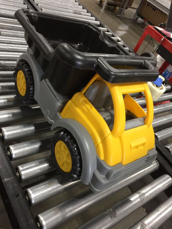 Photo 2 of American Plastic Toys Kids’ Yellow Gigantic Dump Truck, Tilting Dump Bed, Knobby Wheels, and Metal Axles Fit for Indoors and Outdoors, Haul Sand, Dirt, or Toys, for Ages 2+
