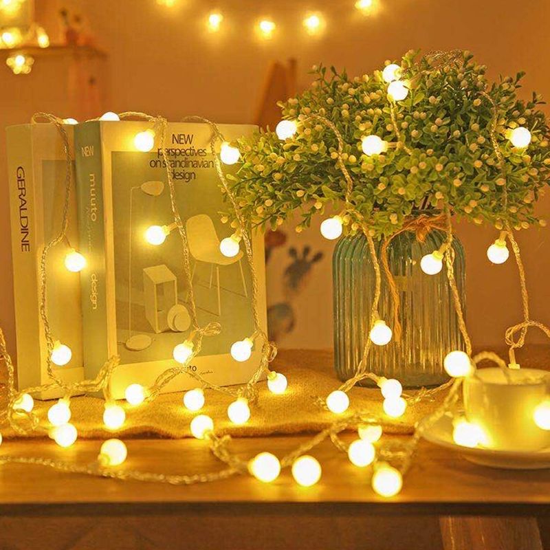 Photo 1 of Koxly Globe String Lights 49 Ft 100 LED Waterproof Decoration Light Strings Plug in Fairy Lights with Remote Control for Indoor Outdoor Bedroom Christmas Party Xmas Tree
