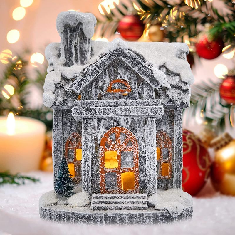 Photo 1 of Snow Village Christmas Lit Building, Christmas Scene Village Lit House with Warm White LED Light, 7.5 Inch House Statue Ornament with Christmas Tree, Resin Collectible Buildings Battery Operated
