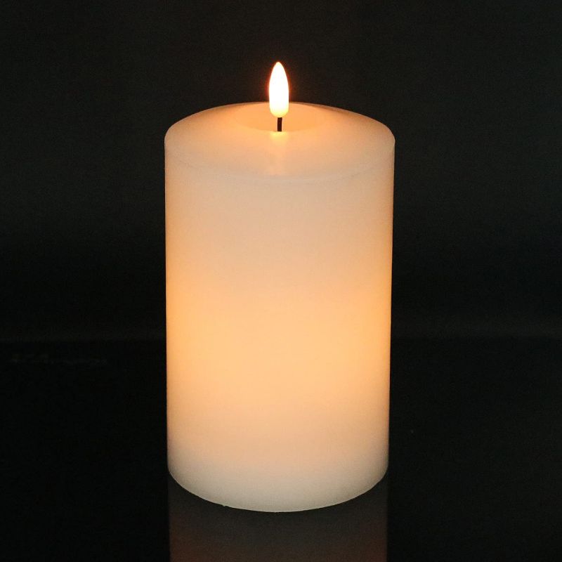 Photo 1 of Eldnacele Large Flameless Flickering Candles White 3D Realistic Black Wick with Timer, 4” X 7.5” Battery Operated Real Wax Pillar Candles Warm White for Home Wedding Party Festival Decoration