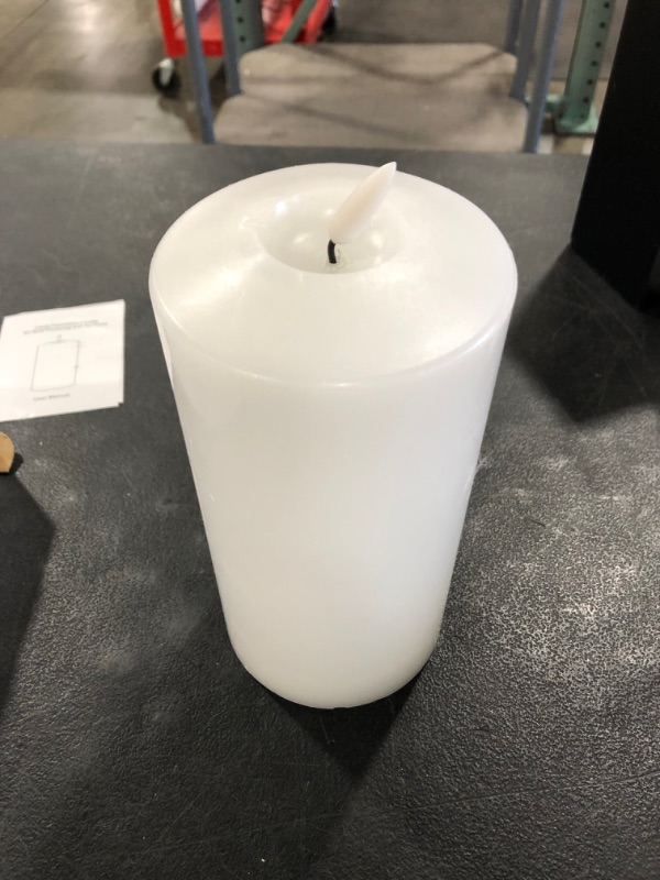 Photo 2 of Eldnacele Large Flameless Flickering Candles White 3D Realistic Black Wick with Timer, 4” X 7.5” Battery Operated Real Wax Pillar Candles Warm White for Home Wedding Party Festival Decoration