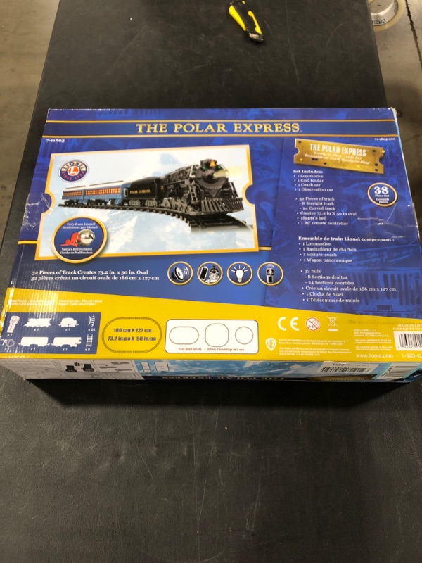 Photo 1 of Lionel The Polar Express battery-powered Train Set with Remote + 12-Piece Straight Track Expansion Pack
