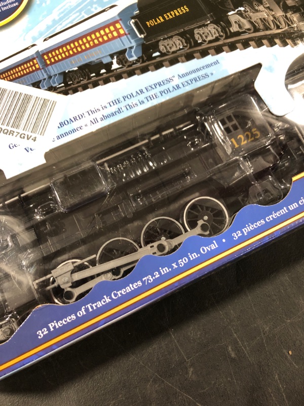 Photo 1 of Lionel The Polar Express battery-powered Train Set with Remote + 12-Piece Straight Track Expansion Pack
