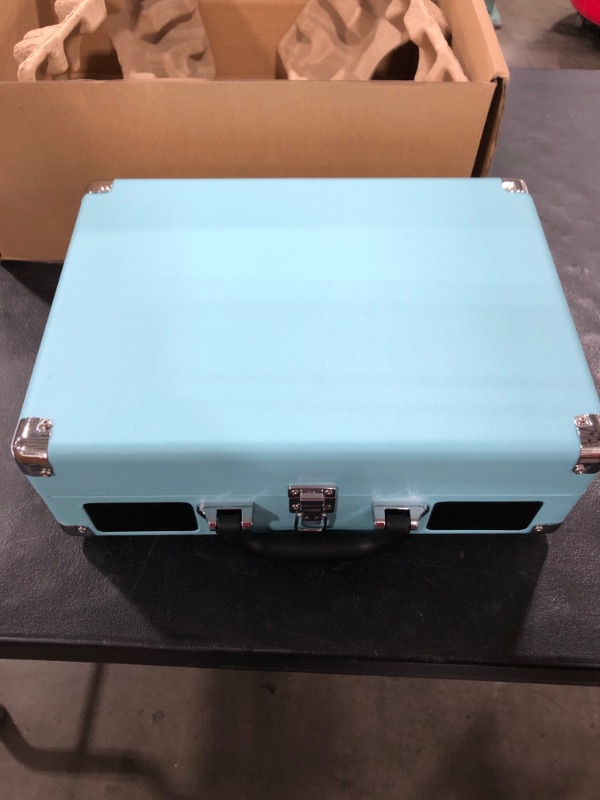 Photo 2 of Victrola Vintage 3-Speed Bluetooth Portable Suitcase Record Player with Built-in Speakers | Upgraded Turntable Audio Sound| Includes Extra Stylus | Turquoise, Model Number: VSC-550BT
OPEN BOX.