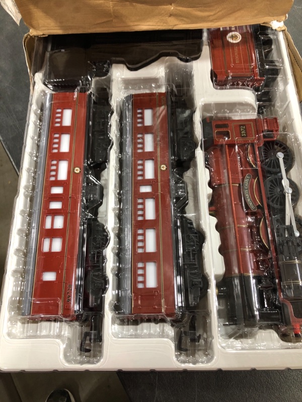 Photo 3 of Lionel Hogwarts Express Battery-Powered Train Set with Remote + Inner Loop Track Expansion Pack. BOX DAMAGE.
