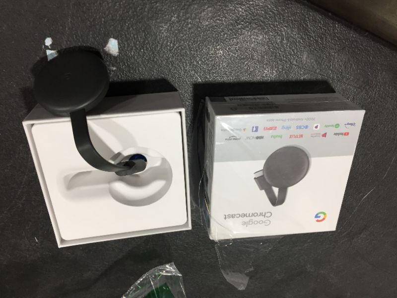 Photo 2 of Google Chromecast - Streaming Device with HDMI Cable - Stream Shows, Music, Photos, and Sports from Your Phone to Your TV
