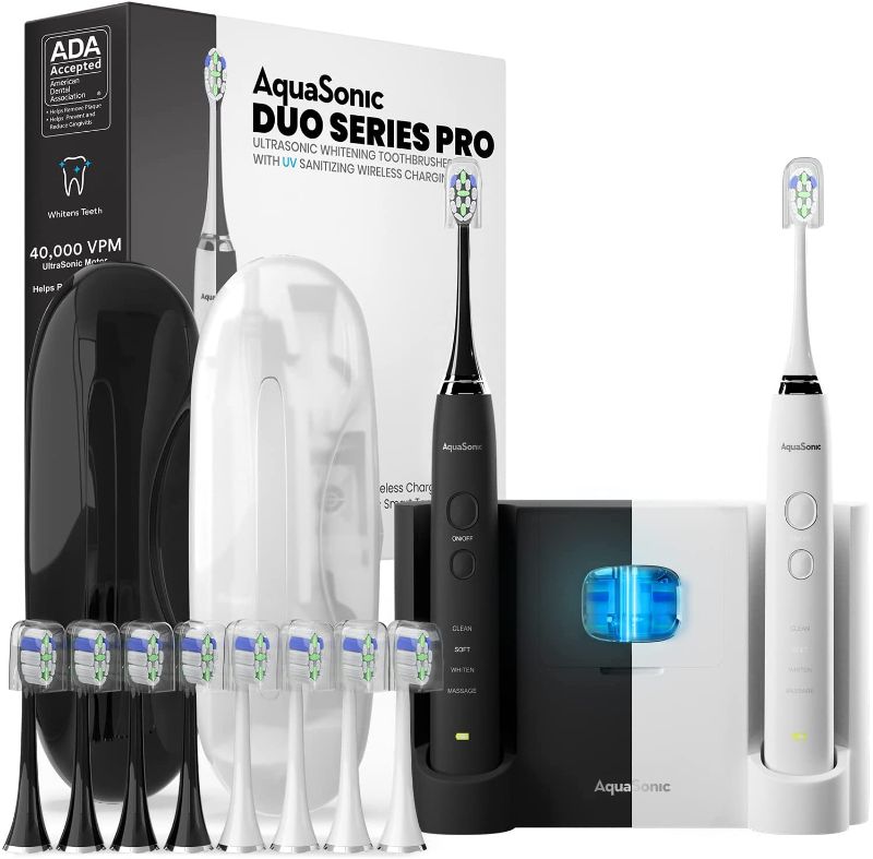 Photo 1 of AquaSonic DUO PRO – Ultra Whitening 40,000 VPM Electric Smart ToothBrushes – ADA Accepted - 4 Modes with Smart Timers - UV Sanitizing & Wireless Charging Base - 10 ProFlex Brush Heads & 2 Travel Cases