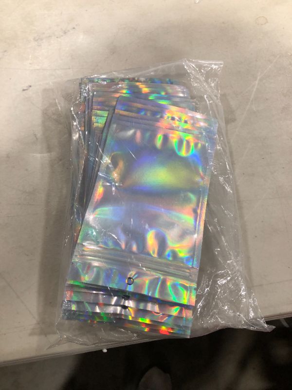 Photo 2 of 100 Pieces Mylar Holographic Resealable Bags - 4 x 6" Smell Proof Bags, Foil Pouch Ziplock Bags for Party Favor Food Storage (Holographic Color, 4 x 6 Inch)
