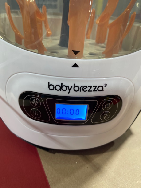 Photo 3 of Baby Brezza Baby Bottle Sterilizer and Dryer Machine – Electric Steam Sterilization - Universal Fit - Pacifiers, Glass, Plastic, and Newborn Feeding Bottles
