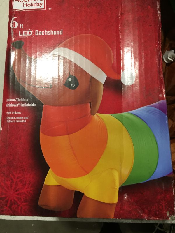 Photo 1 of 6 ft Pre-Lit LED Airblown Dachshund Dog with Rainbow Sweater Christmas Inflatable
